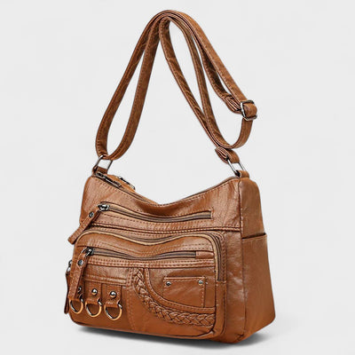 Nora. – Borsa a tracolla multilivello ispirata al vintage