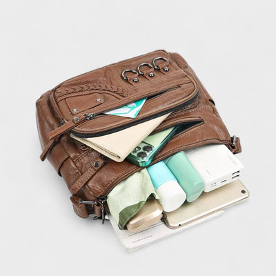 Nora. – Borsa a tracolla multilivello ispirata al vintage