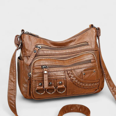 Nora. – Borsa a tracolla multilivello ispirata al vintage